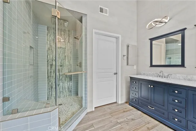 a swimming pool with outdoor seating and yard