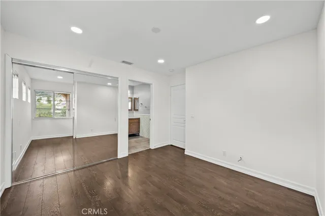 a view of a lake with a yard