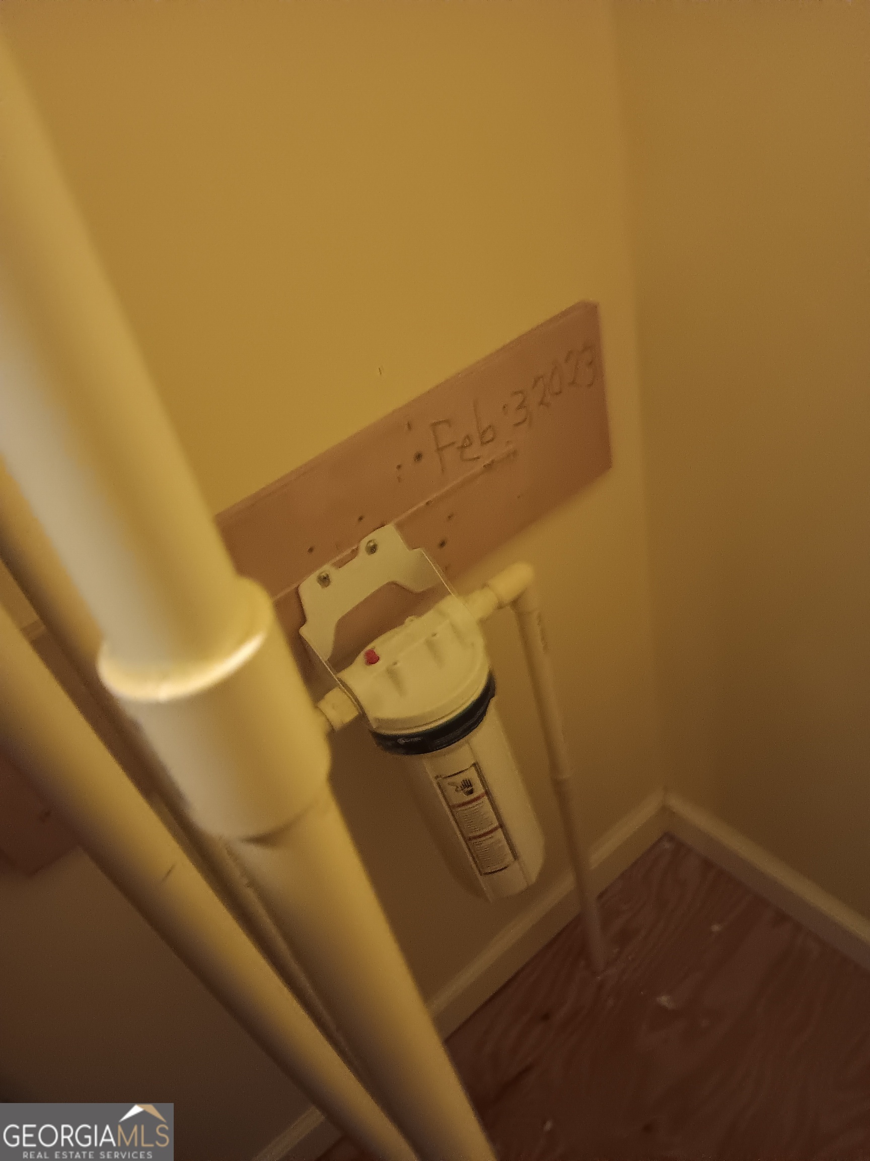 9430 Highway 16 Sparta, GA 31087 - Photo 29 of 37 WATER FILTER IN WATER HEATER ROOM