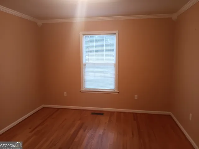 a bathroom with a shower and a toilet
