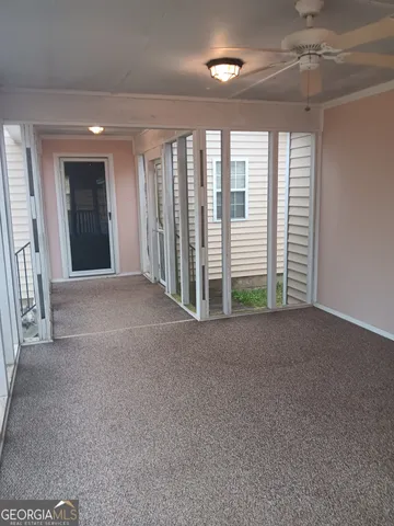 a view of a livingroom with a staircase