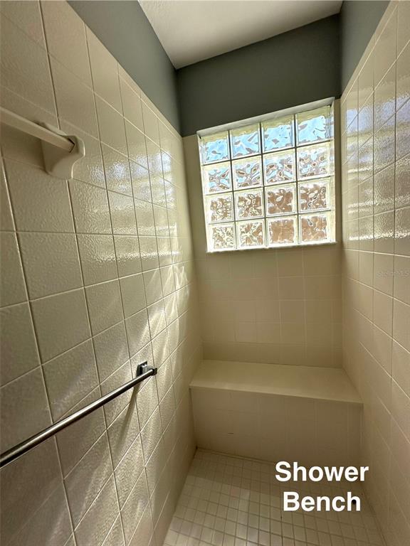 9706 Southwest 92nd Place Road Ocala, FL 34481 - Photo 16 of 82 a bathroom with a bathtub