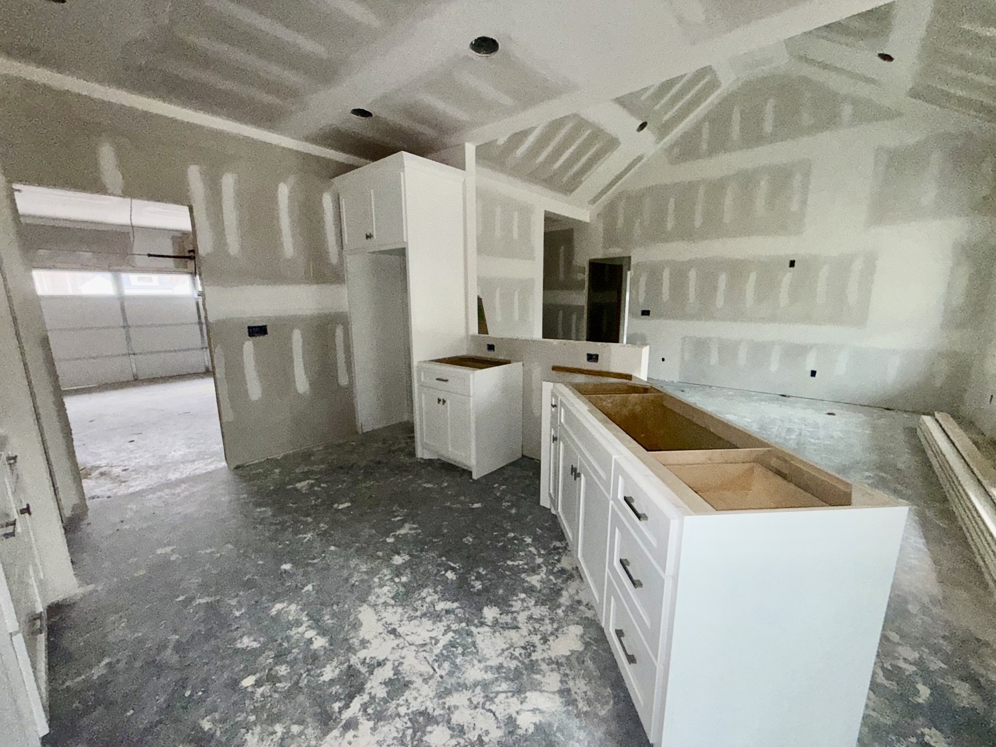 670 North Ballard Road Manchester, TN 37355 - Photo 8 of 22 a kitchen with a sink a refrigerator and cabinets