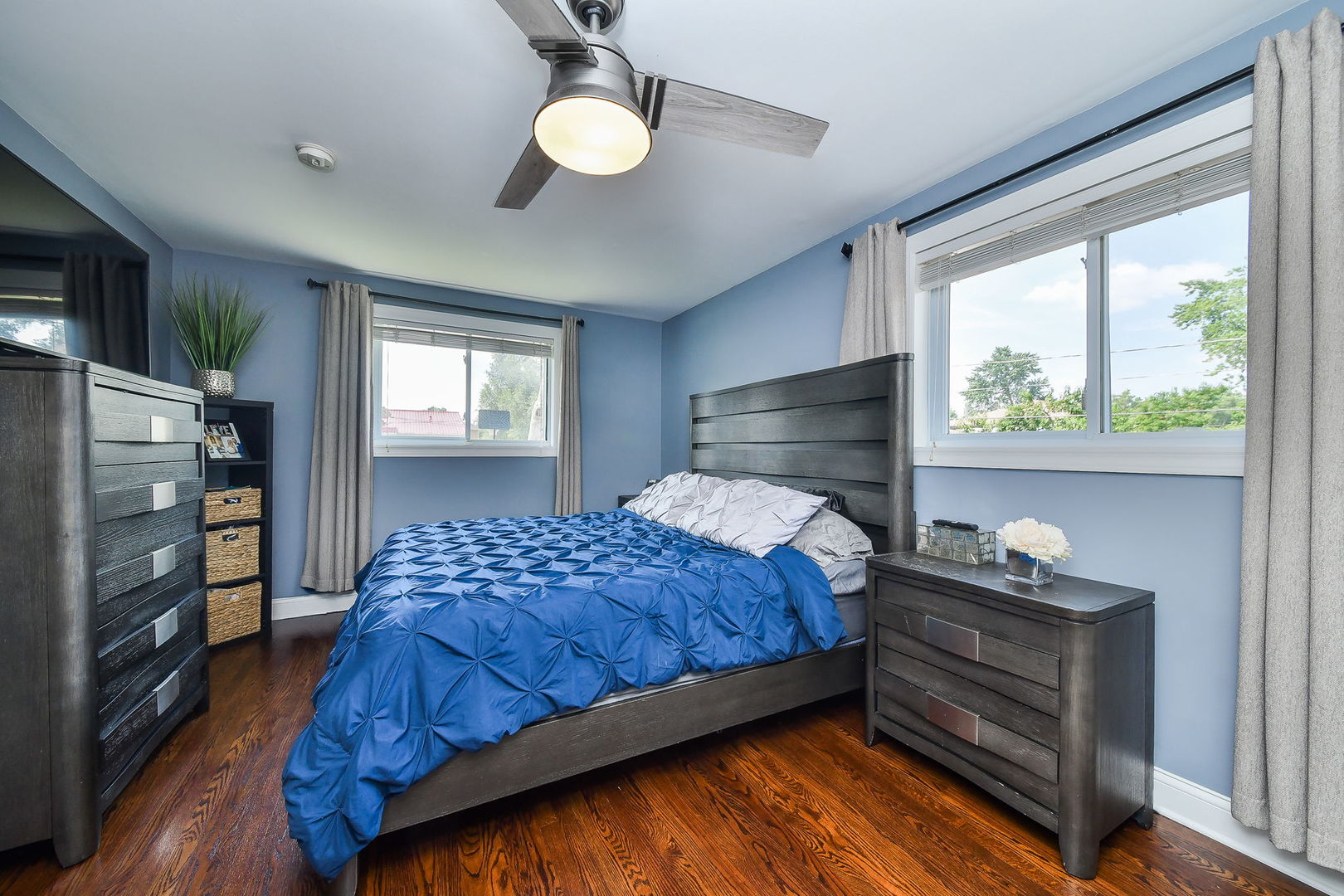 744 Neva Avenue Addison, IL 60101 - Photo 11 of 27 a bedroom with a bed and a window