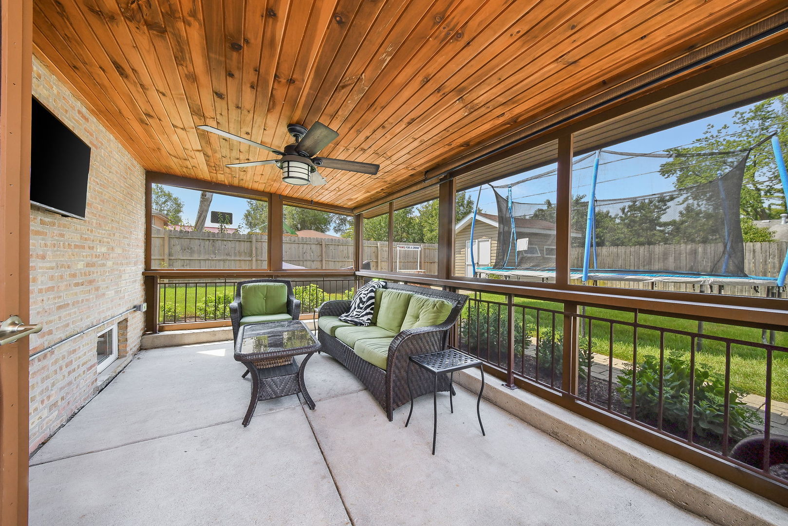 744 Neva Avenue Addison, IL 60101 - Photo 17 of 27 a balcony with furniture and garden view