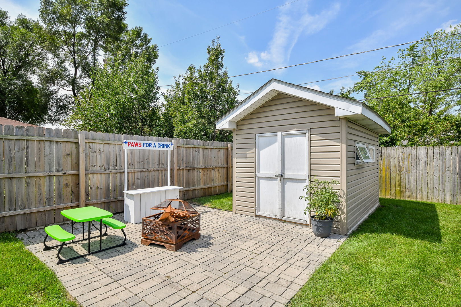 744 Neva Avenue Addison, IL 60101 - Photo 22 of 27 a garden view with a seating space