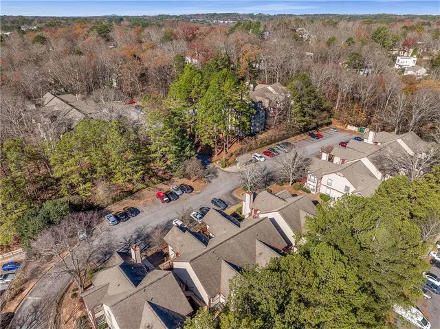 an aerial view of house with yard