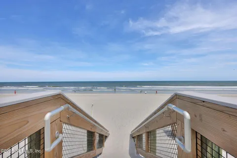 a view of a kitchen with a sink