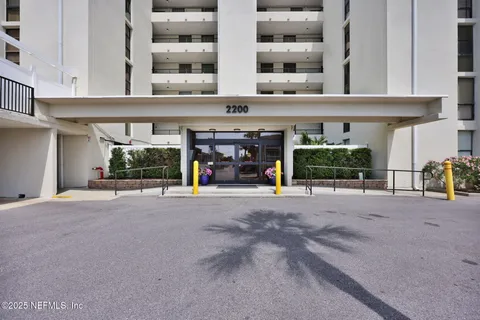 a view of a building with a street