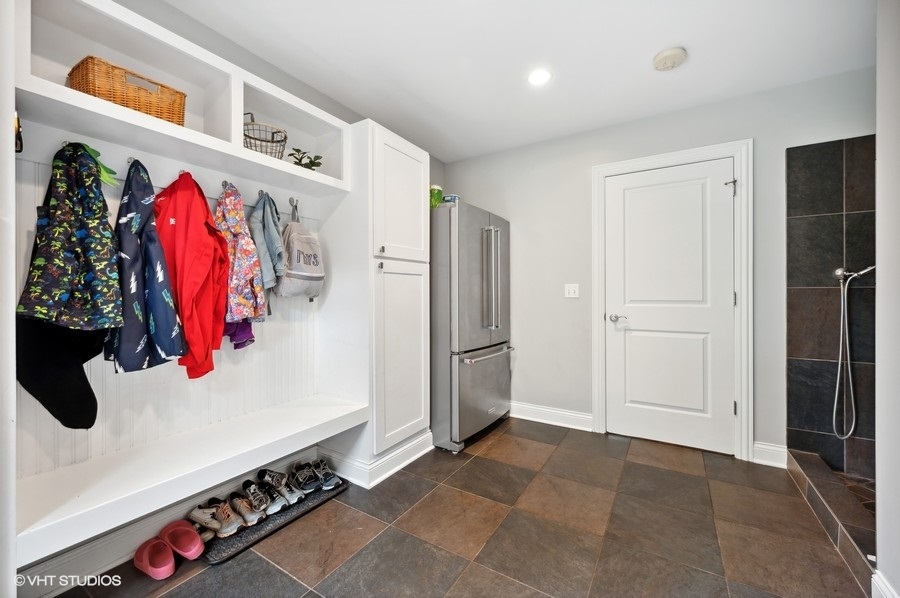 201 Summerfield Road Northbrook, IL 60062 - Photo 23 of 51 a view of walk in closet with clothes and shoes
