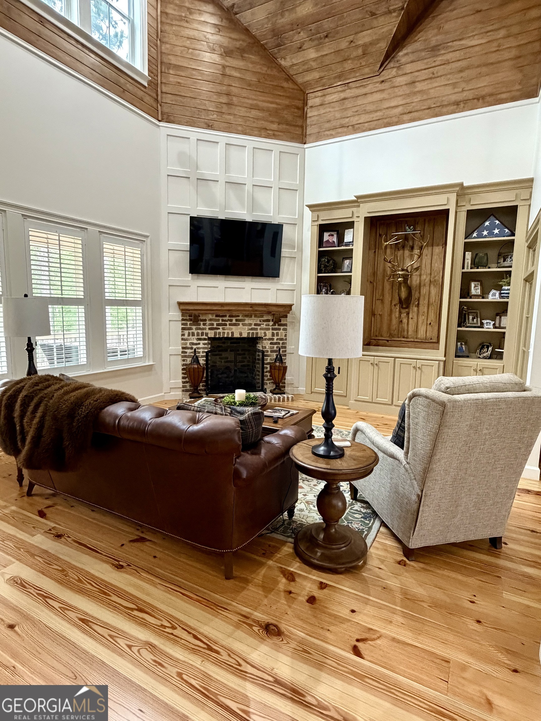 1065 Tarrytown Road Tarrytown, GA 30470 - Photo 17 of 130 a living room with furniture fireplace and flat screen tv