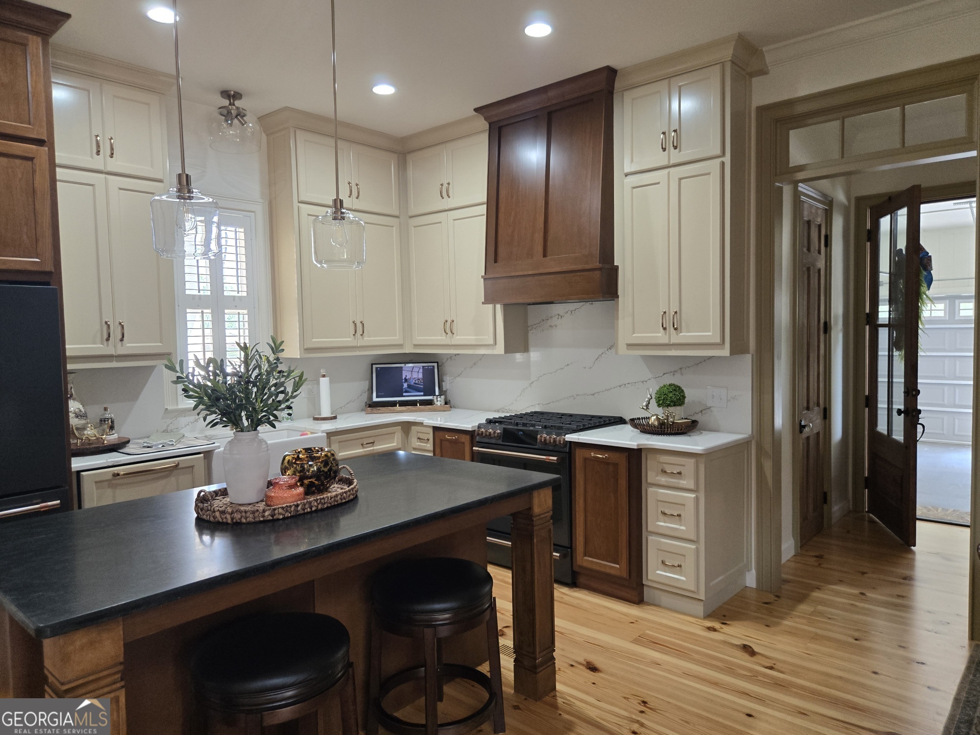 1065 Tarrytown Road Tarrytown, GA 30470 - Photo 26 of 130 a kitchen with a sink stove and cabinets