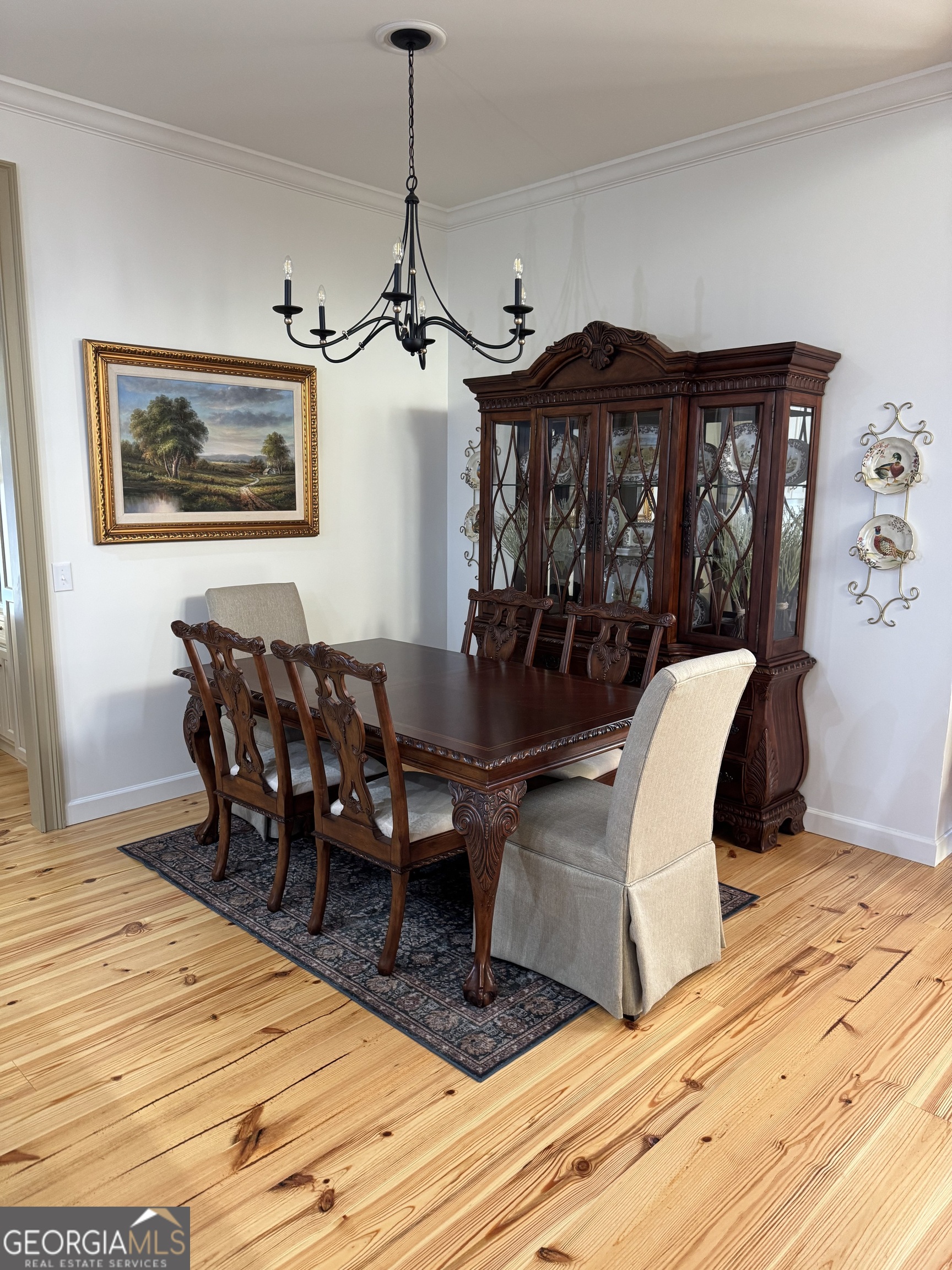 1065 Tarrytown Road Tarrytown, GA 30470 - Photo 28 of 130 a view of a dining room with furniture window and wooden floor
