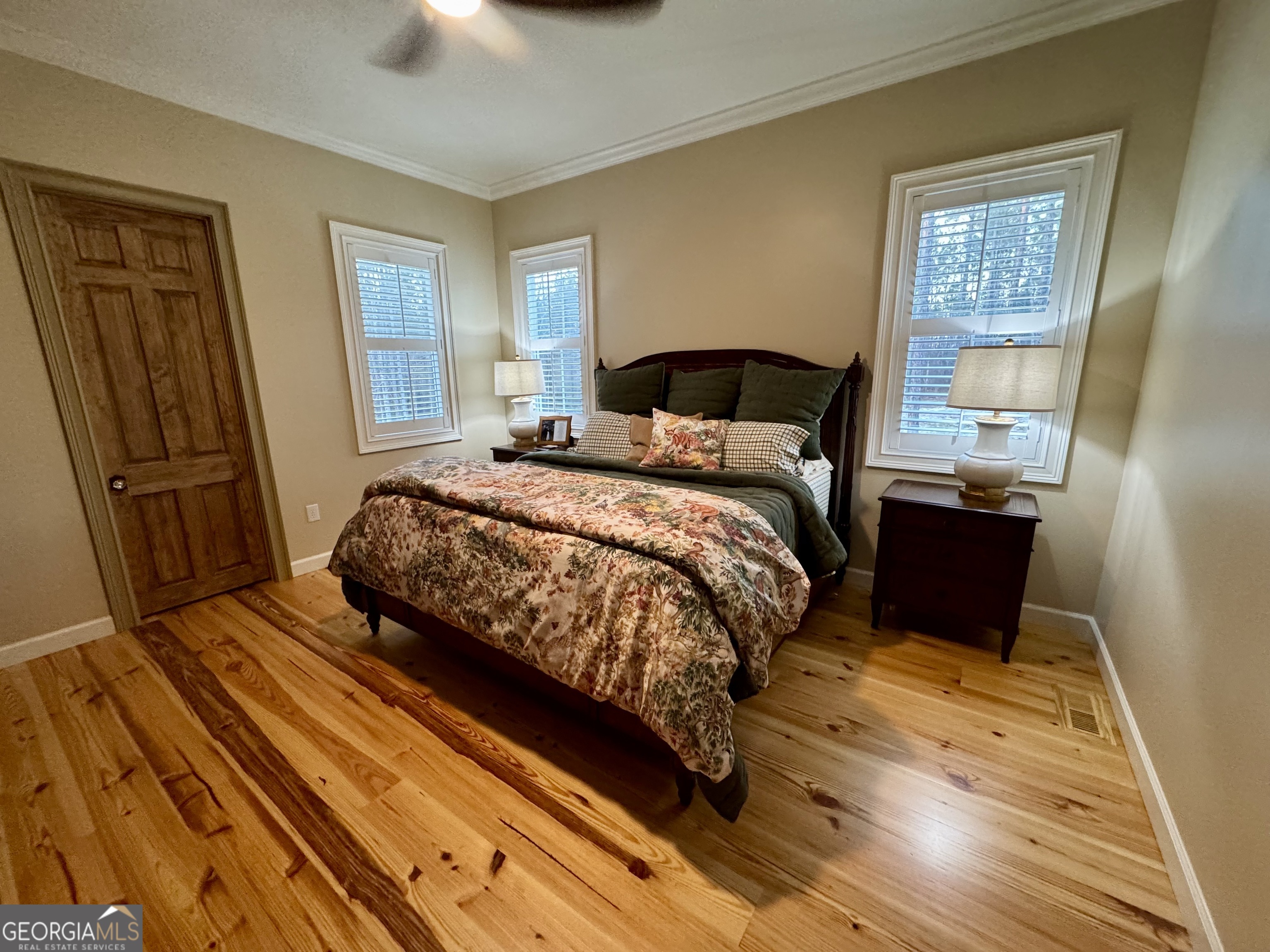 1065 Tarrytown Road Tarrytown, GA 30470 - Photo 36 of 130 a bedroom with a bed and a dresser