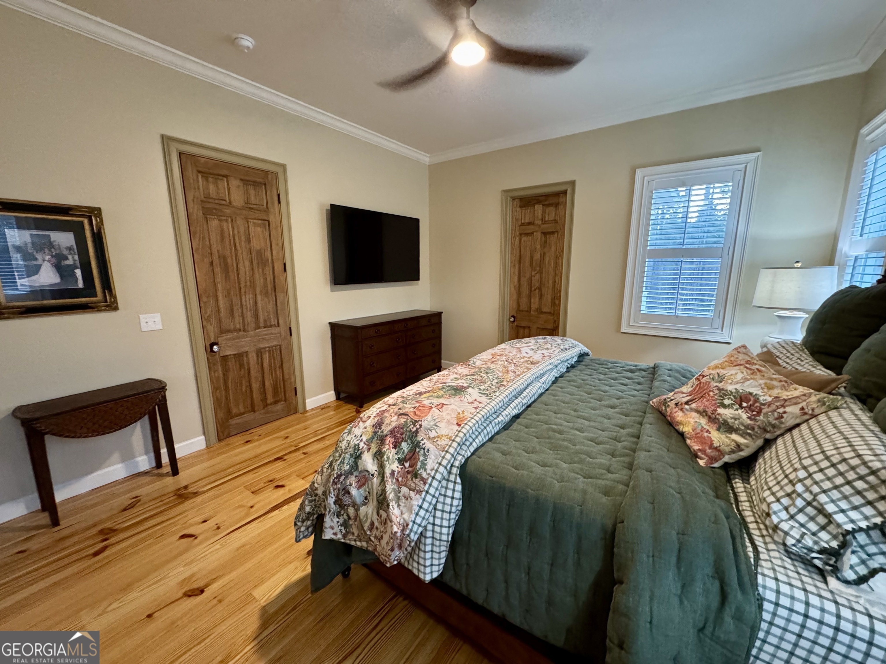 1065 Tarrytown Road Tarrytown, GA 30470 - Photo 37 of 130 a bedroom with a bed and a television