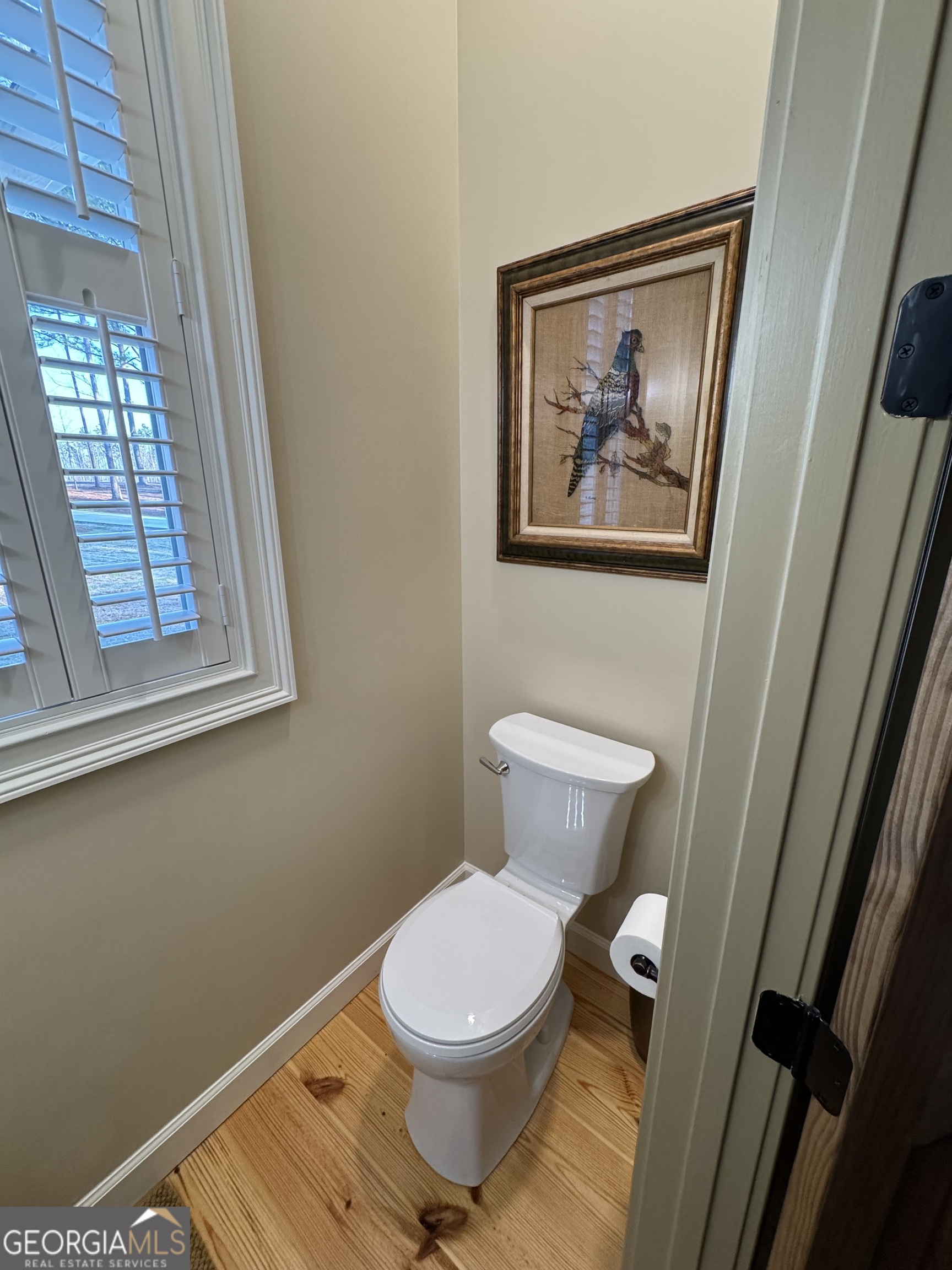 1065 Tarrytown Road Tarrytown, GA 30470 - Photo 38 of 130 a white toilet sitting next to a small window