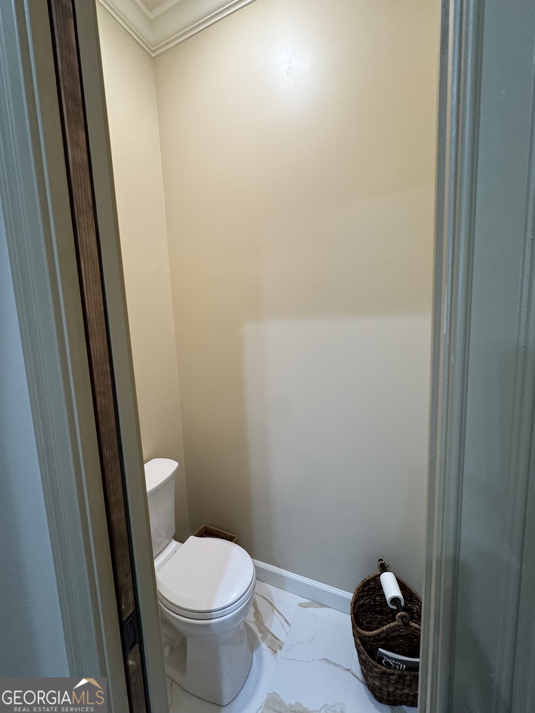 1065 Tarrytown Road Tarrytown, GA 30470 - Photo 44 of 130 a bathroom with a toilet and a sink