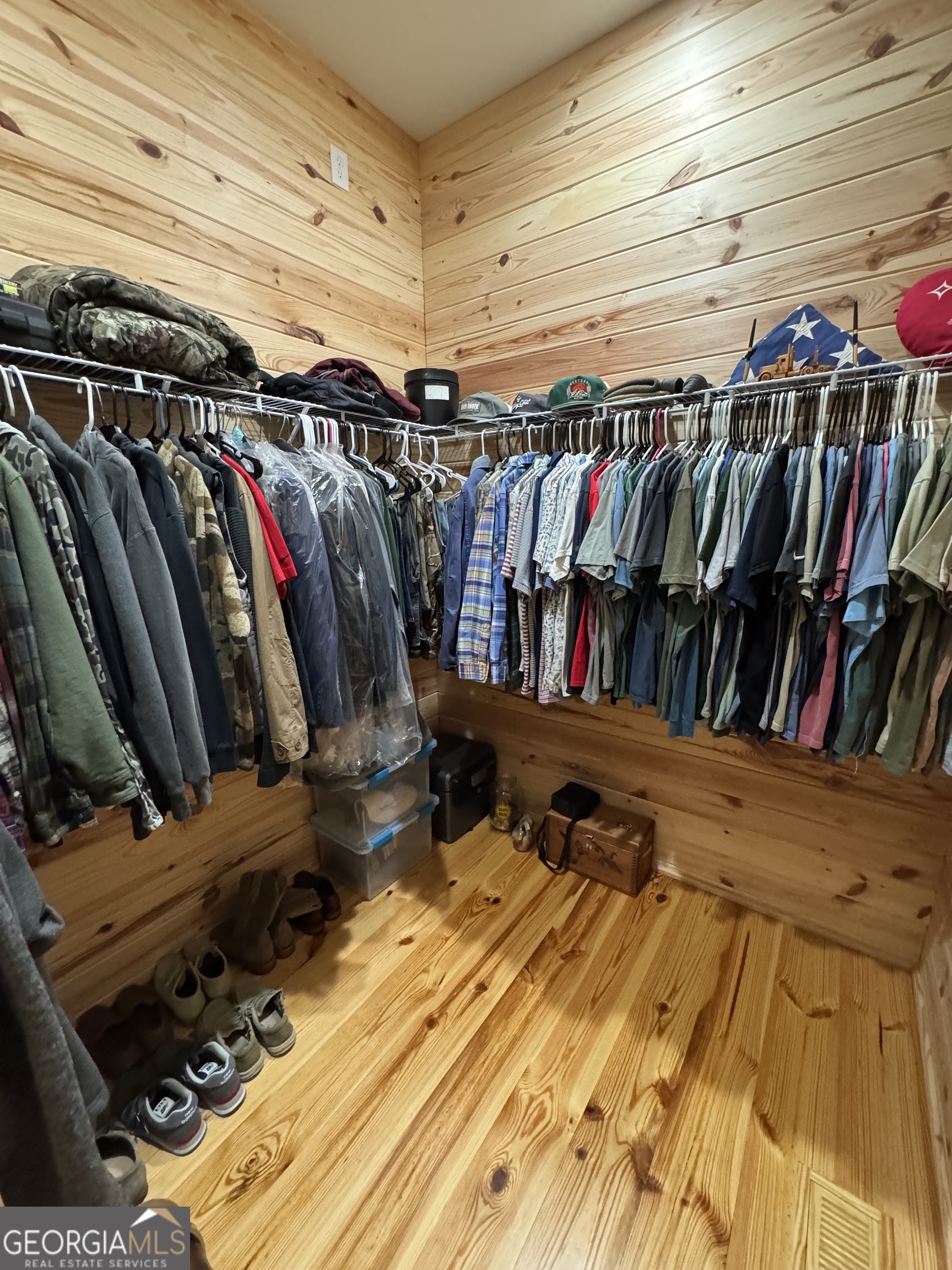 1065 Tarrytown Road Tarrytown, GA 30470 - Photo 49 of 130 a view of walk in closet with clothes and shoes