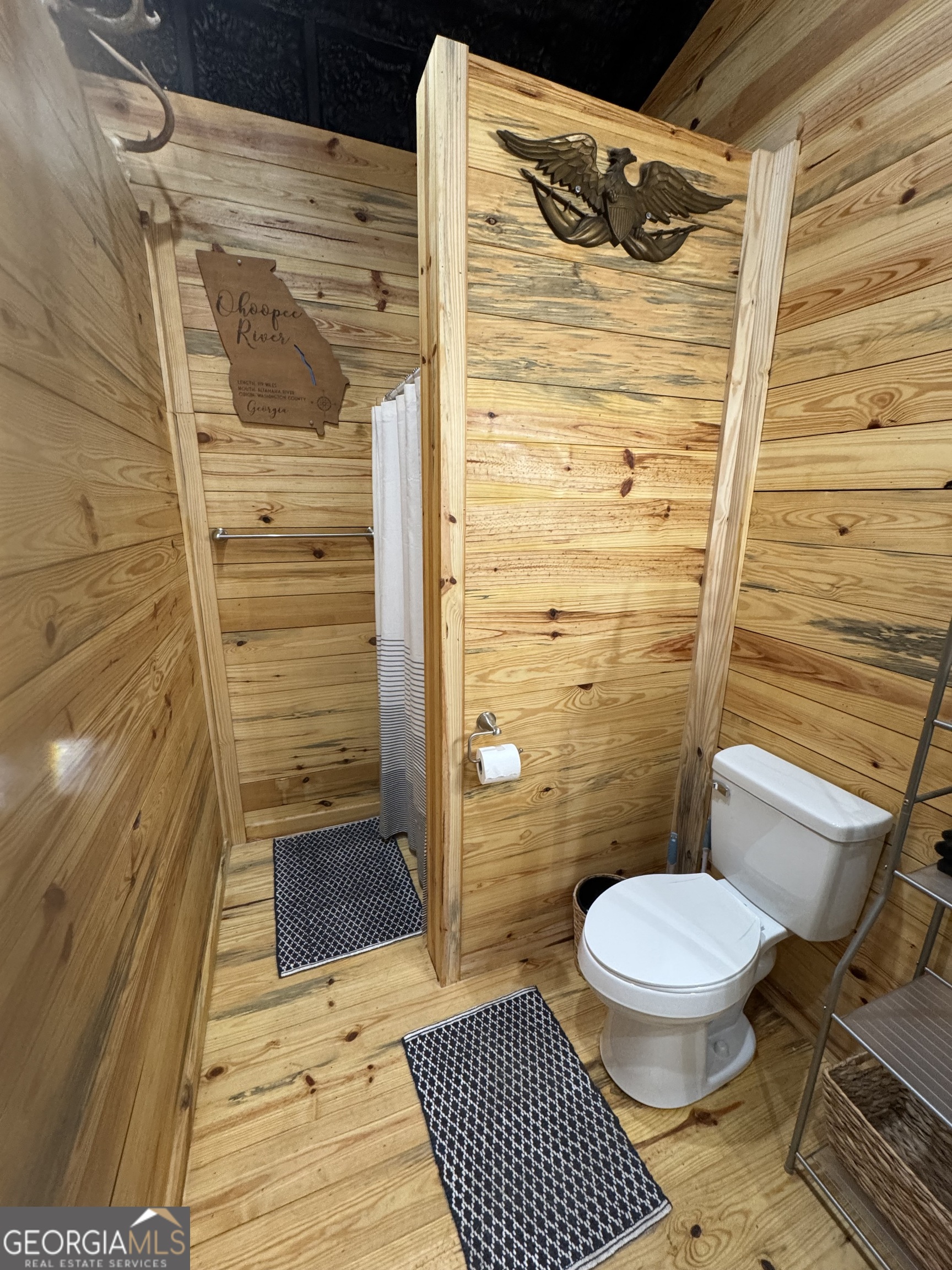 1065 Tarrytown Road Tarrytown, GA 30470 - Photo 64 of 130 a bathroom with a toilet and a shower