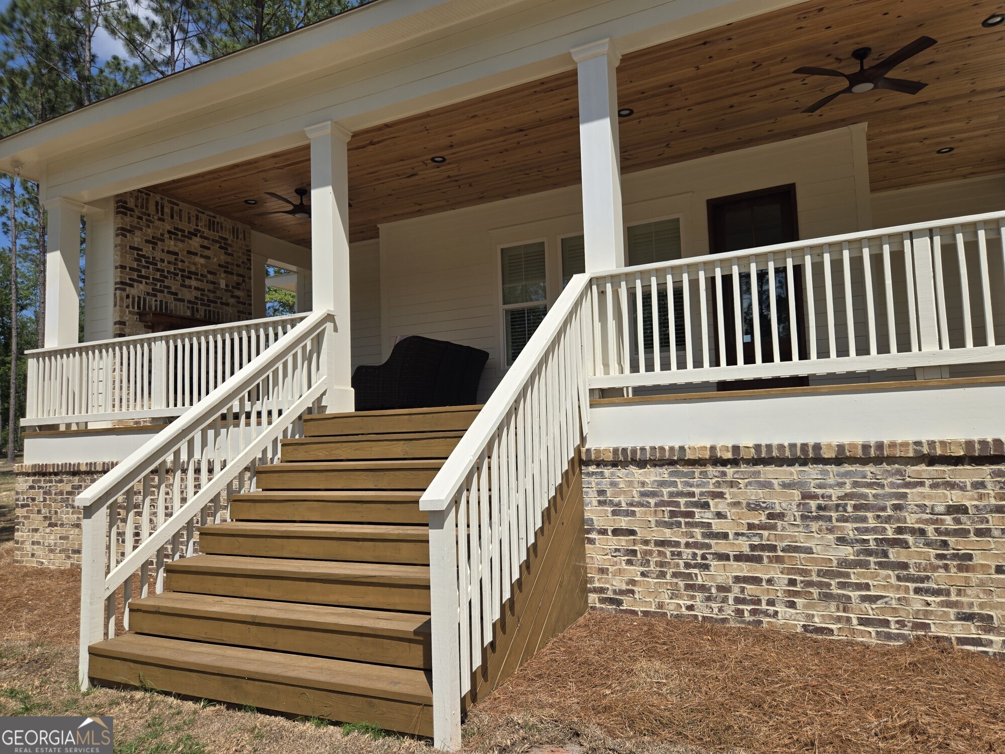 1065 Tarrytown Road Tarrytown, GA 30470 - Photo 7 of 130 a view of staircase with railing and a rug