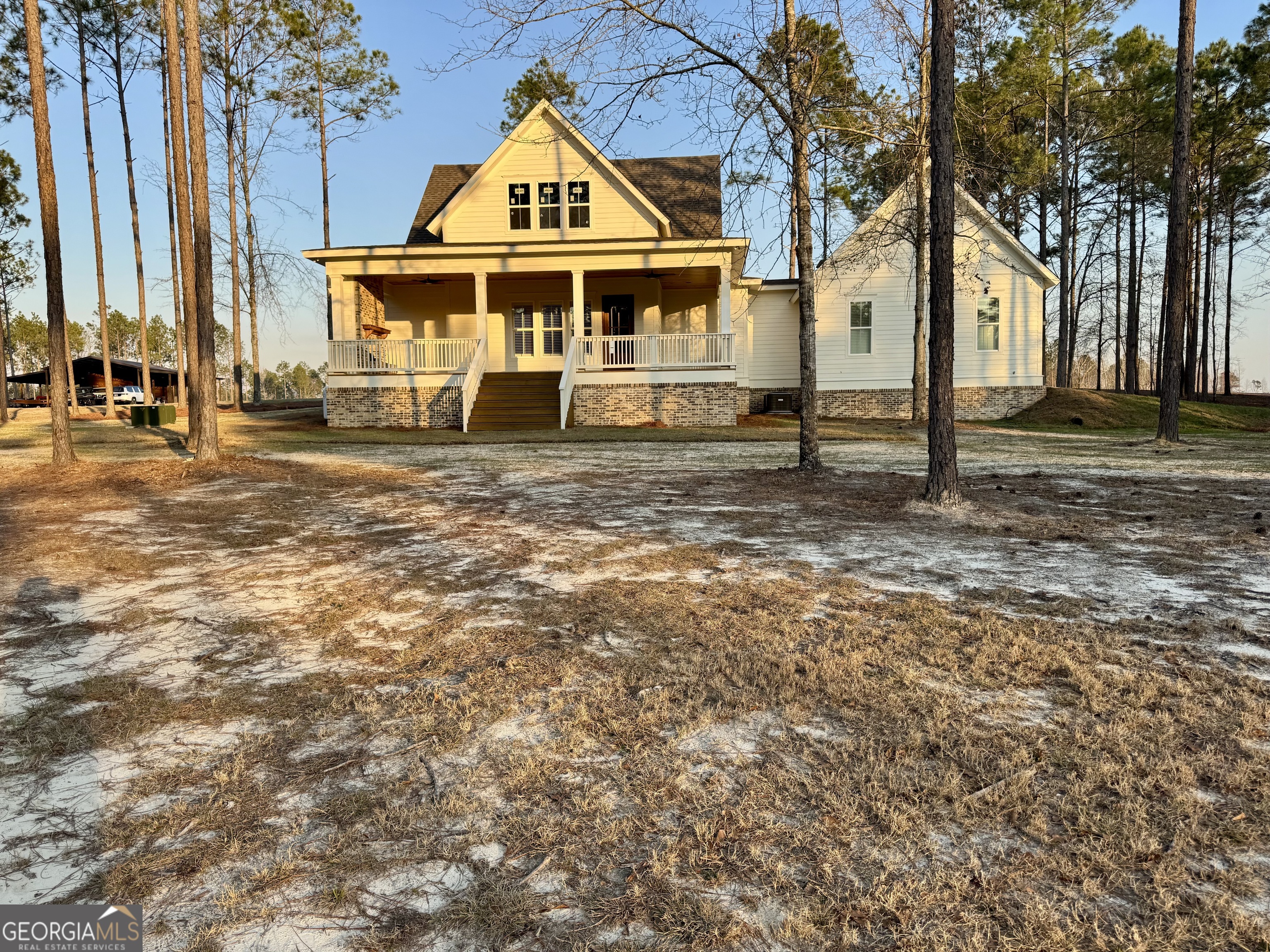 1065 Tarrytown Road Tarrytown, GA 30470 - Photo 8 of 130 a front view of a house with a yard