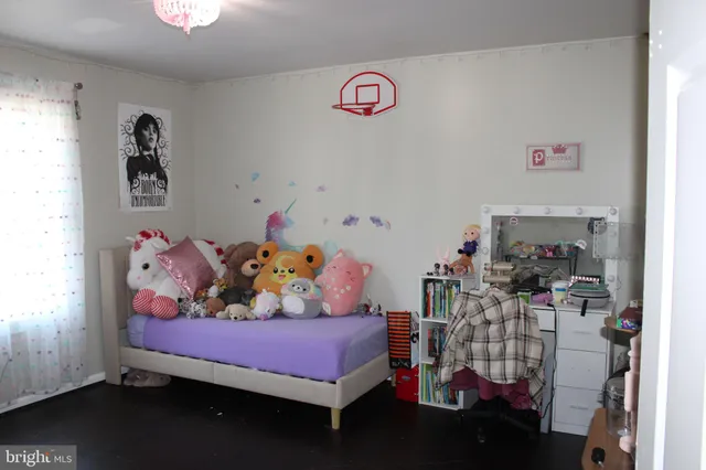 a bedroom with furniture and a bed