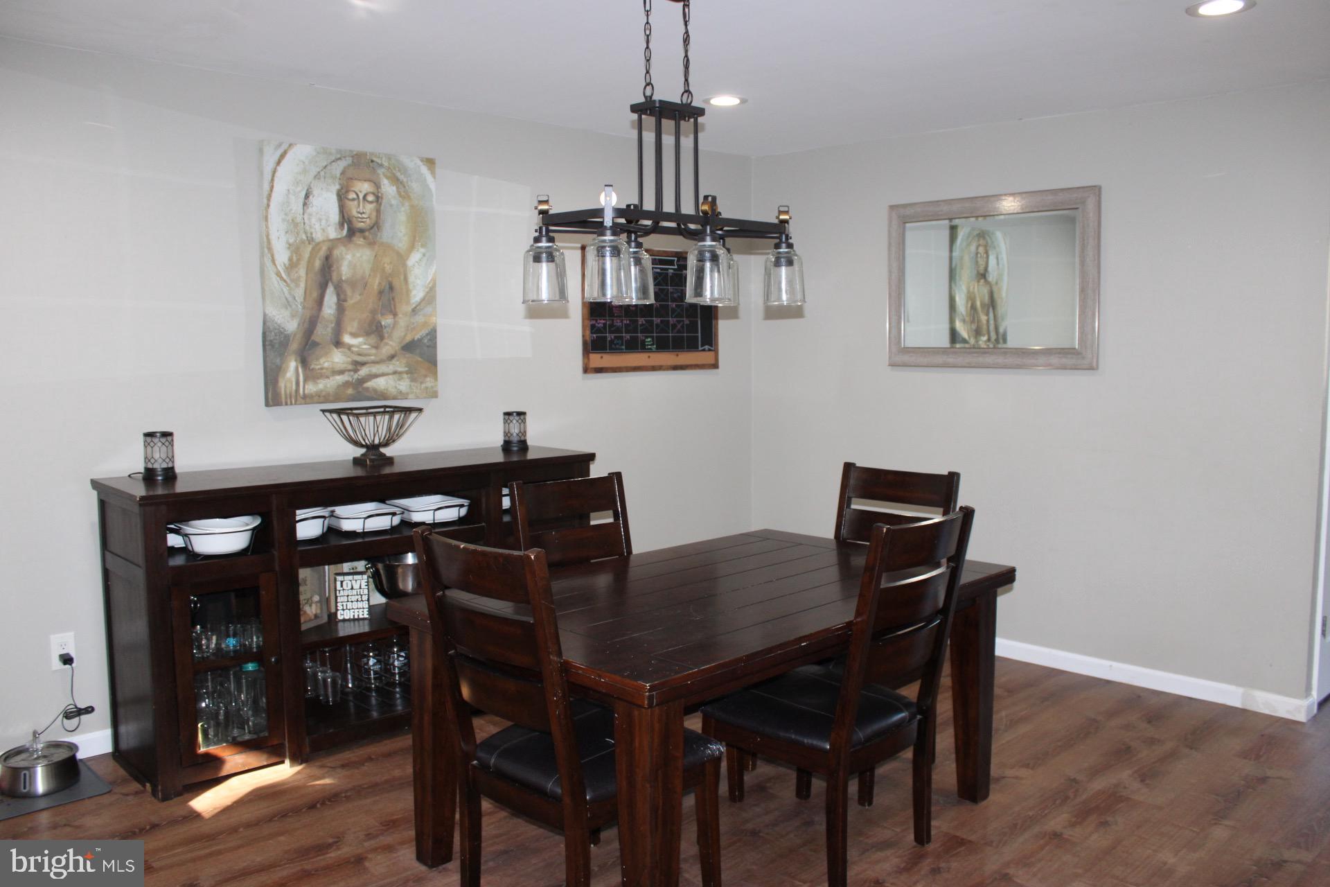 3908 Jackson Road Williamstown, NJ 08094 - Photo 6 of 21 a view of a dining room with furniture and wooden floor
