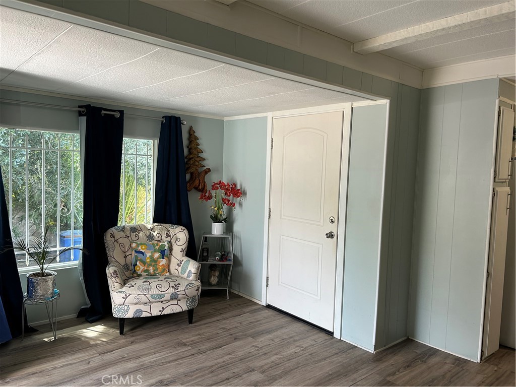 3734 Pacific Street, Unit 40 Highland, CA 92346 - Photo 18 of 35 a living room with furniture and window