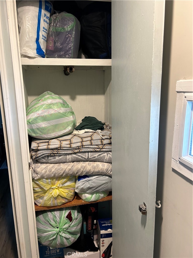 3734 Pacific Street, Unit 40 Highland, CA 92346 - Photo 20 of 35 a close view of shoes stand and cabinets