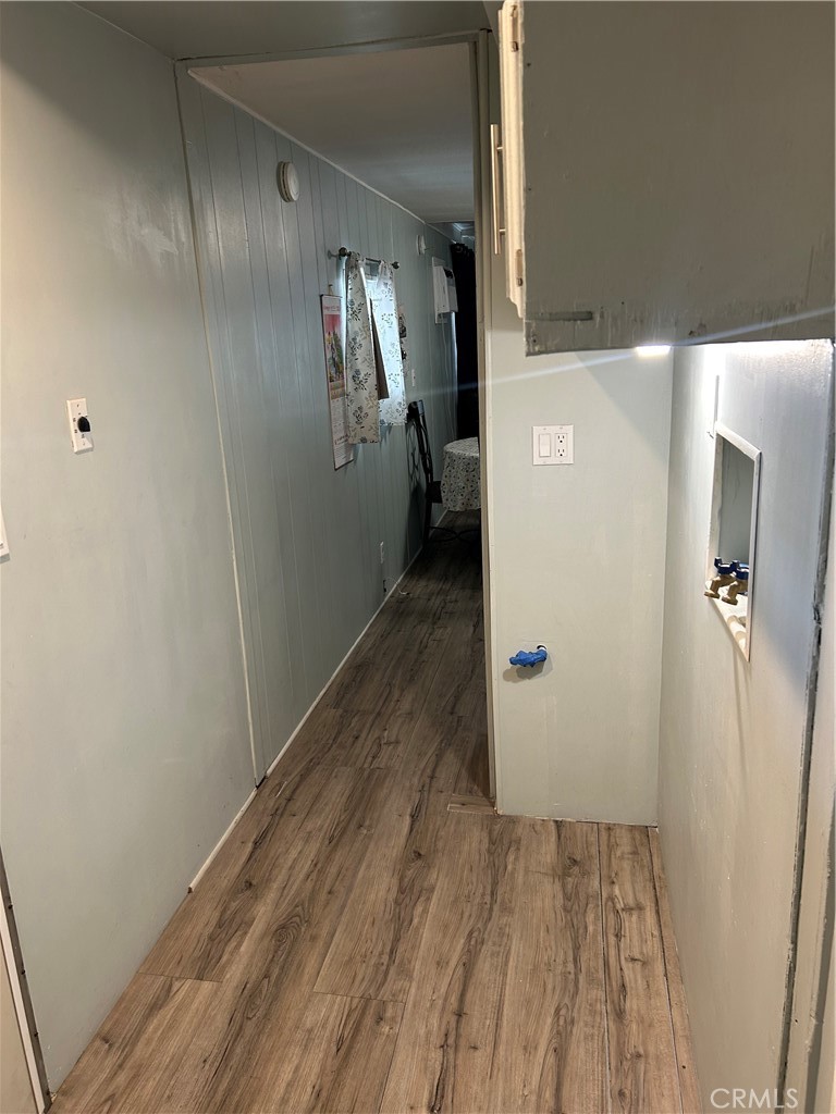 3734 Pacific Street, Unit 40 Highland, CA 92346 - Photo 21 of 35 a view of hallway with wooden floor