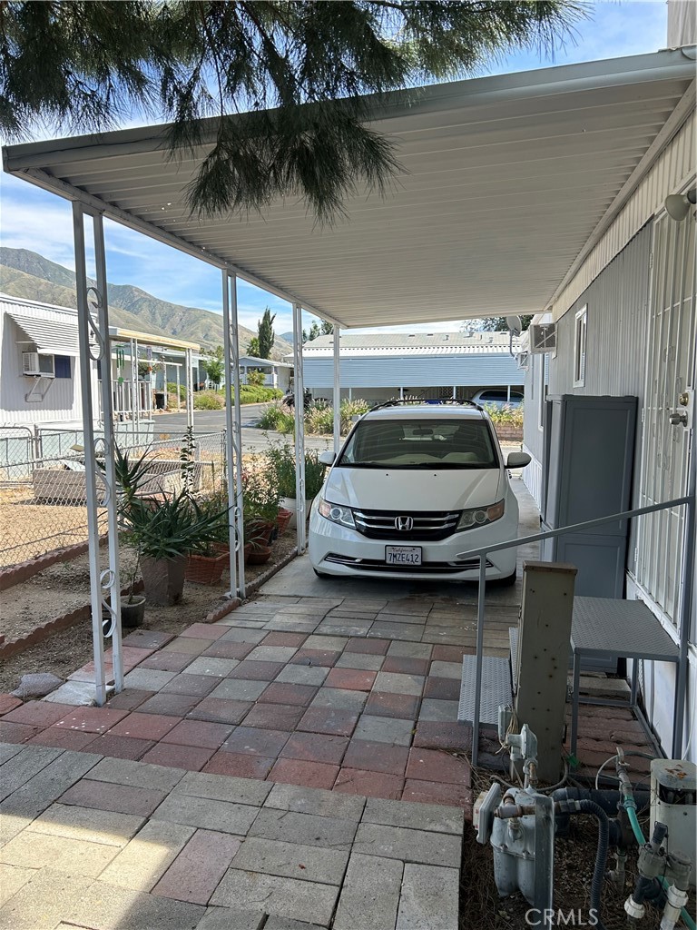 3734 Pacific Street, Unit 40 Highland, CA 92346 - Photo 25 of 35 a car parked in parking garage