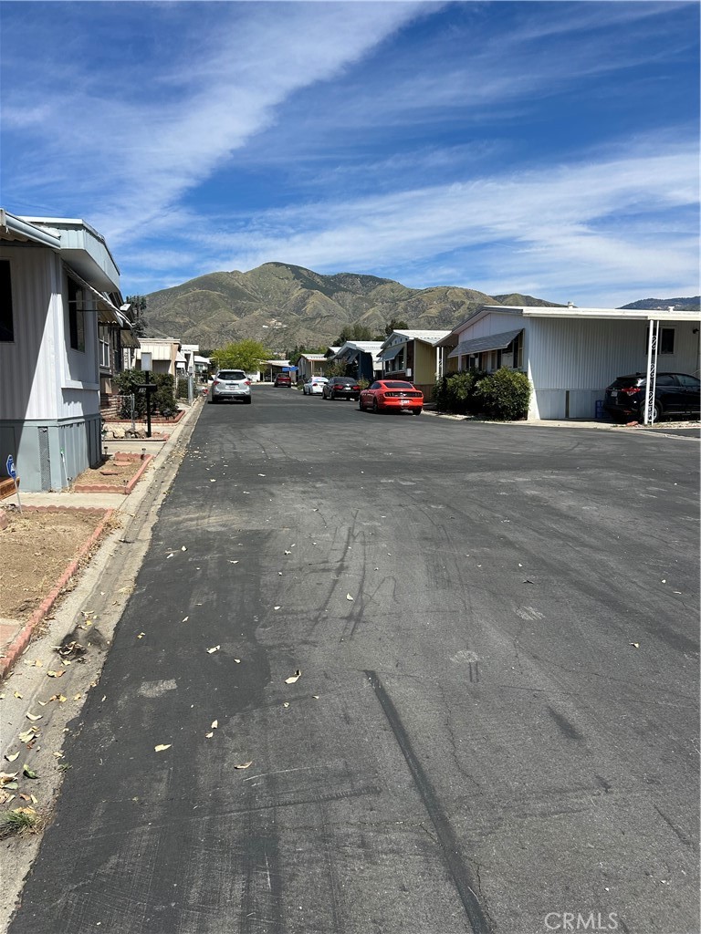 3734 Pacific Street, Unit 40 Highland, CA 92346 - Photo 35 of 35 a view of building with car parked
