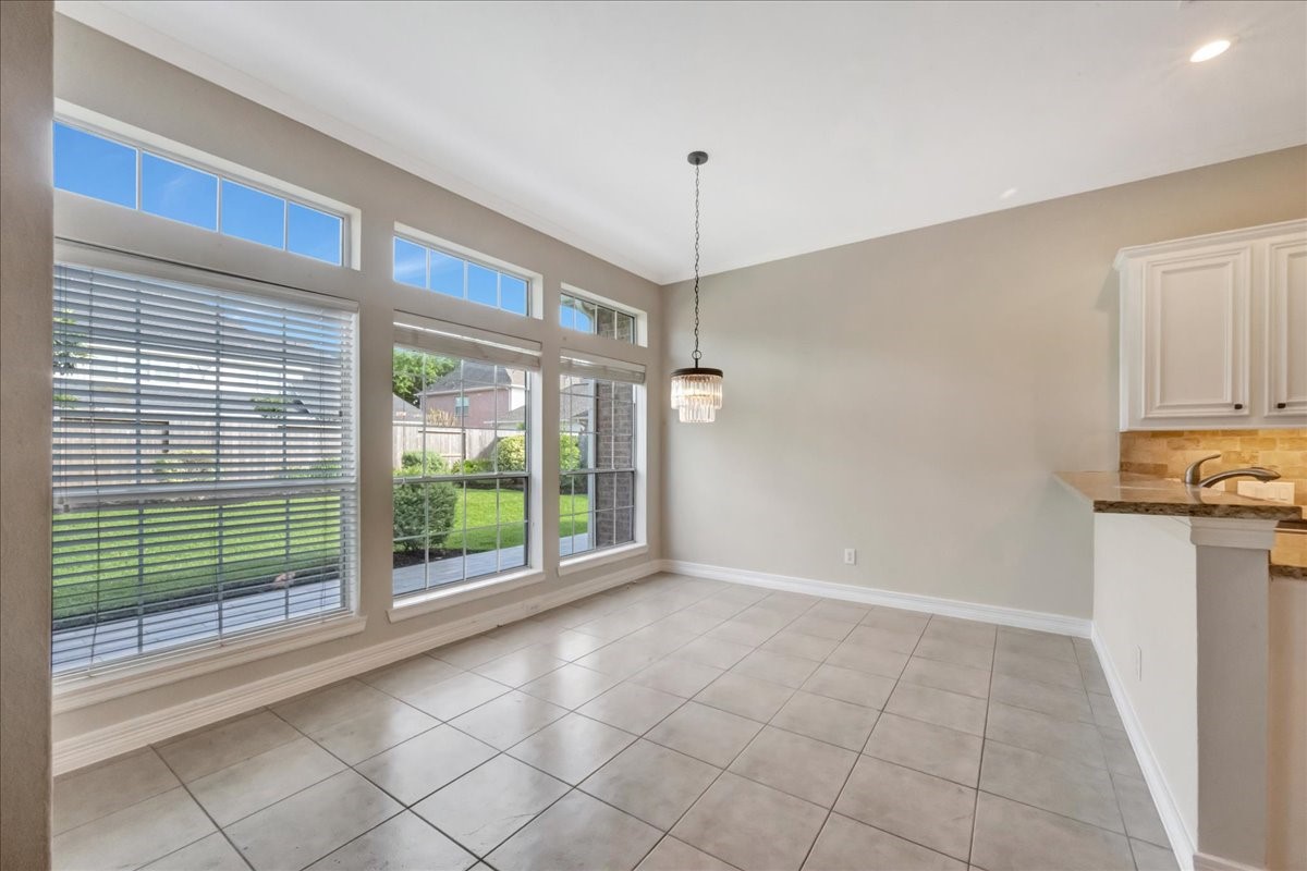 15511 Turtle Oak Court Houston, TX 77059 - Photo 24 of 50 a view of an empty room with a window