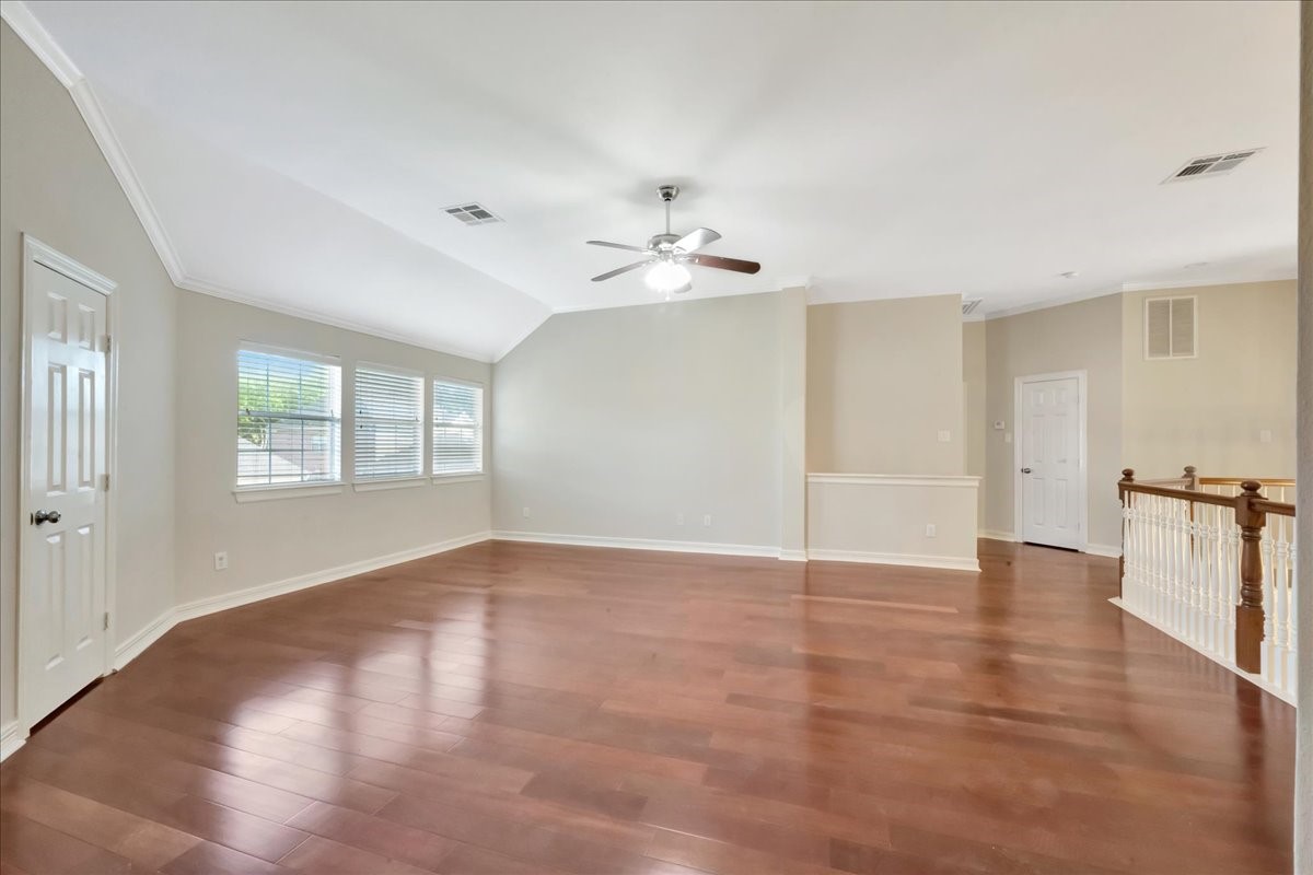 15511 Turtle Oak Court Houston, TX 77059 - Photo 38 of 50 wooden floor in an empty room with a window