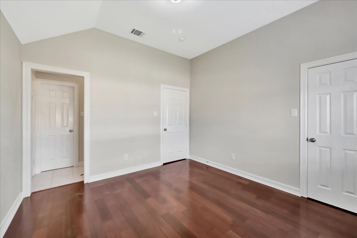 15511 Turtle Oak Court Houston, TX 77059 - Photo 46 of 50 a view of an empty room with wooden floor