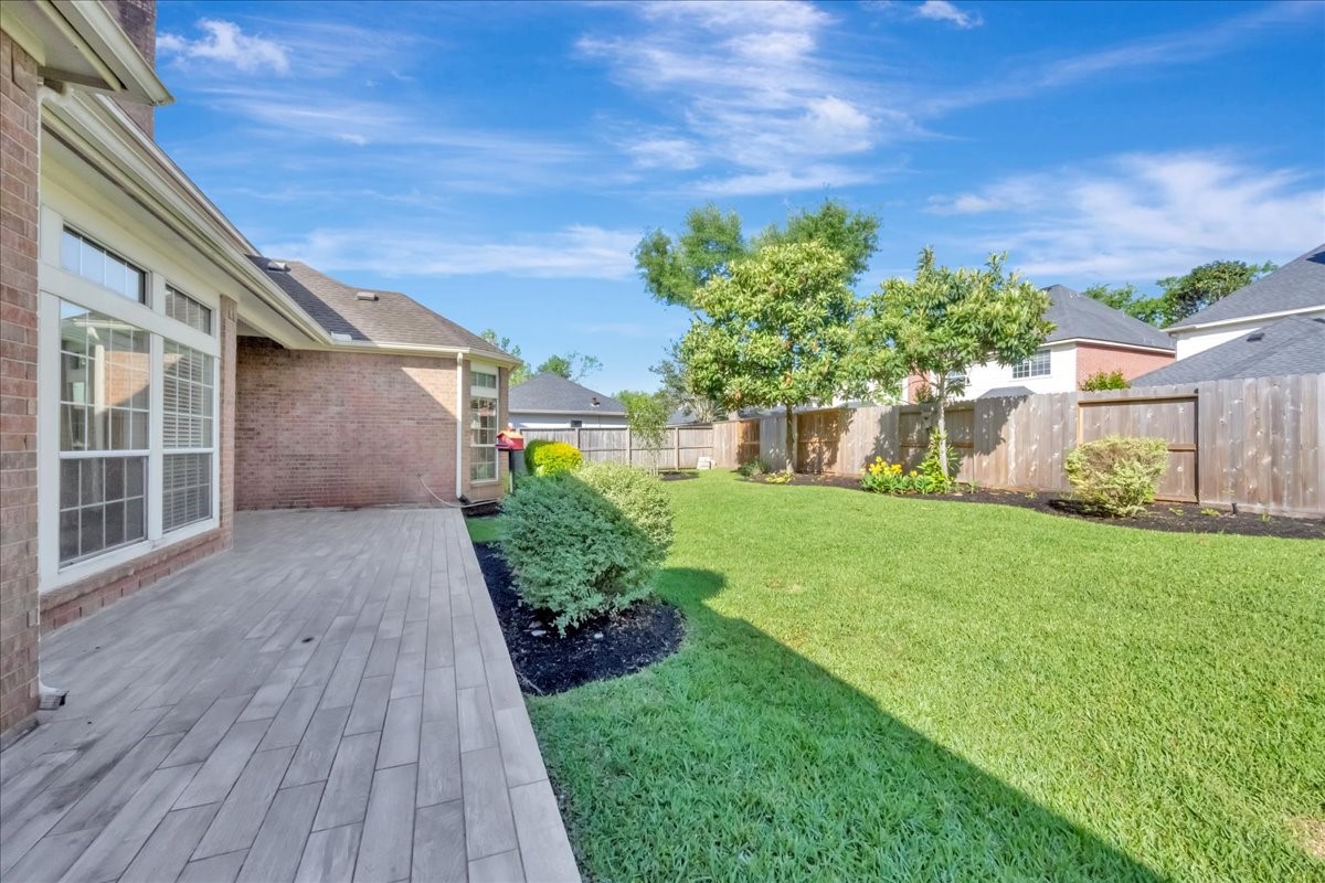 15511 Turtle Oak Court Houston, TX 77059 - Photo 48 of 50 a front view of a house with a yard
