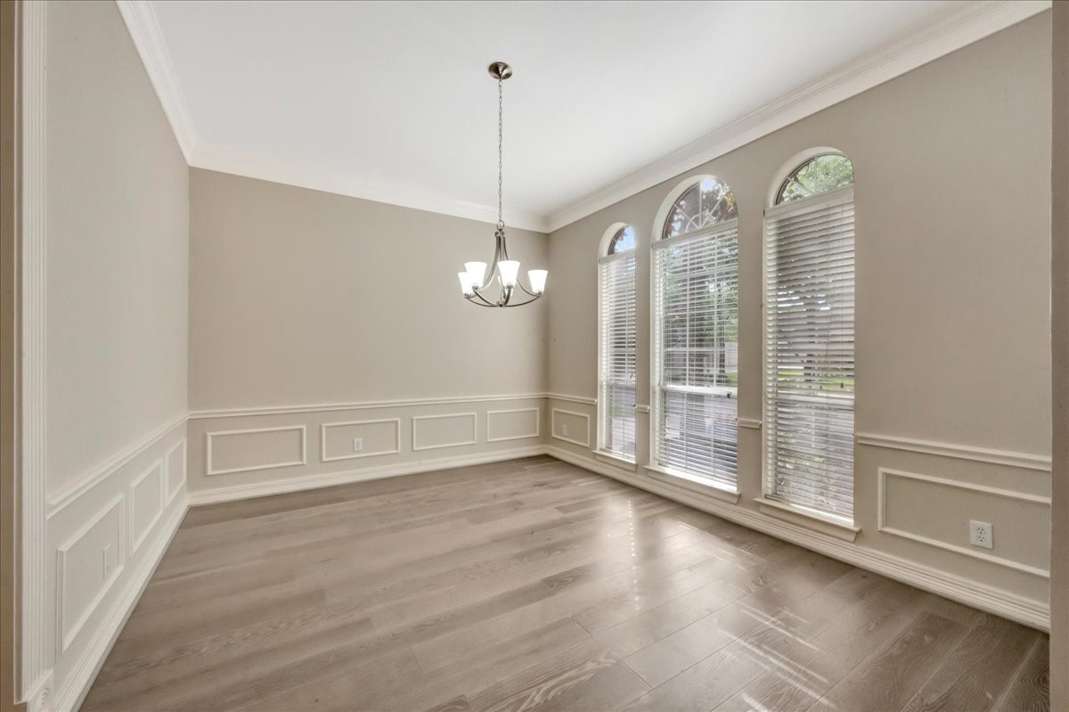 15511 Turtle Oak Court Houston, TX 77059 - Photo 7 of 50 a view of a room with wooden floor fan and windows