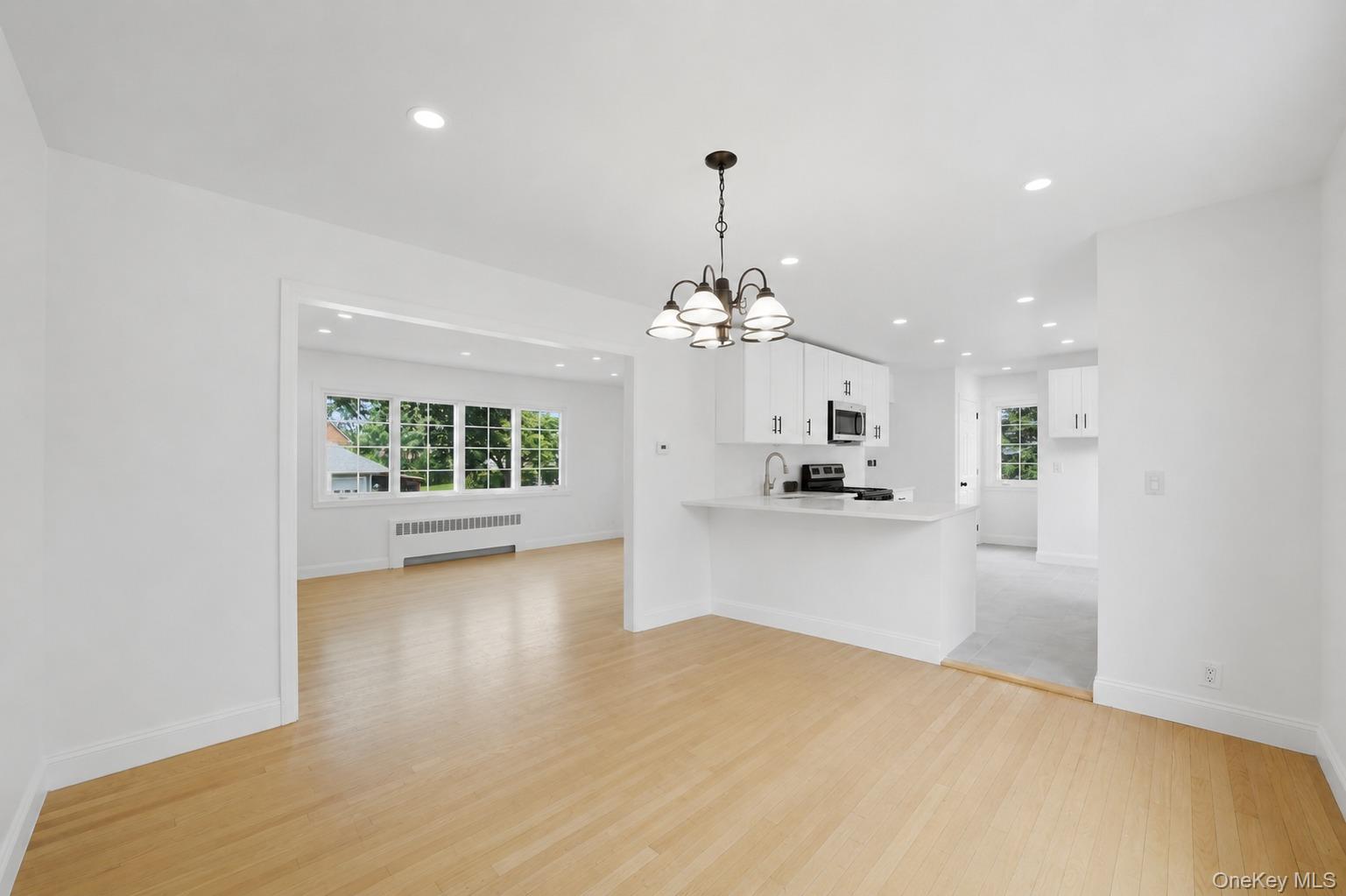 144 Bell Road Scarsdale, NY 10583 - Photo 9 of 49 Open Concept living room, dining room, kitchen