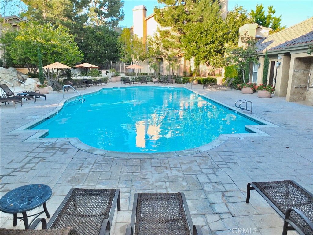 19431 Rue De Valore, Unit 19B Lake Forest, CA 92610 - Photo 20 of 24 a view of a backyard with sitting area