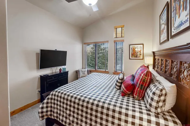 a bathroom with a shower sink and mirror