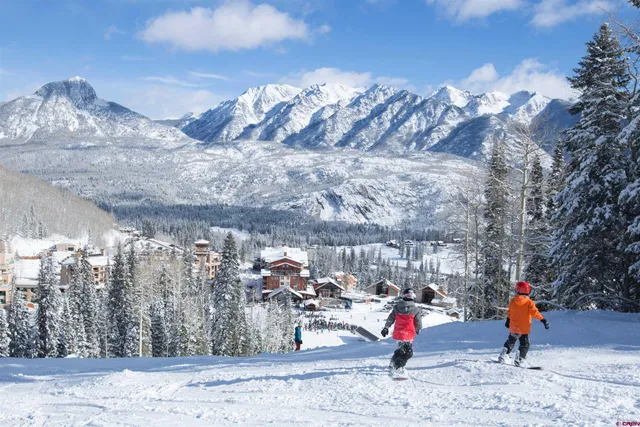 a view of a swimming pool and a chairs
