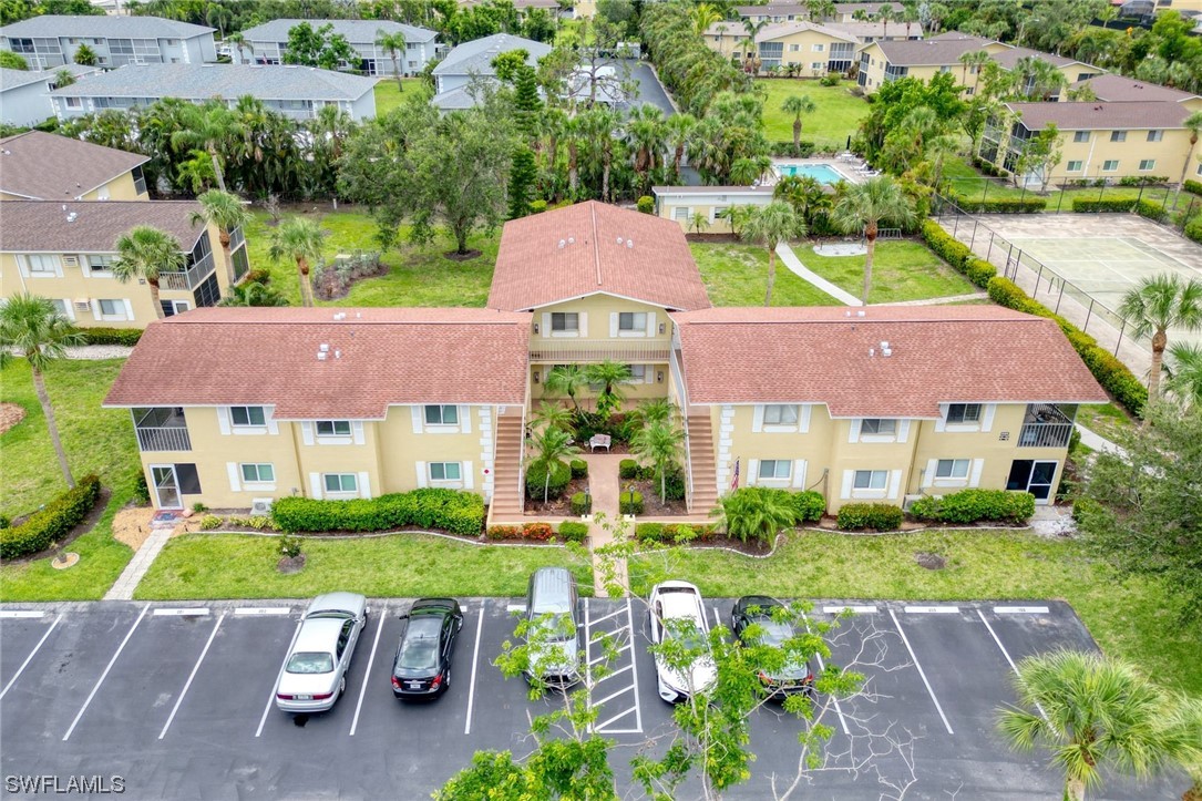 8109 Country Road, Unit 202 Fort Myers, FL 33919 - Photo 3 of 29 a view of yard in front of house with a yard
