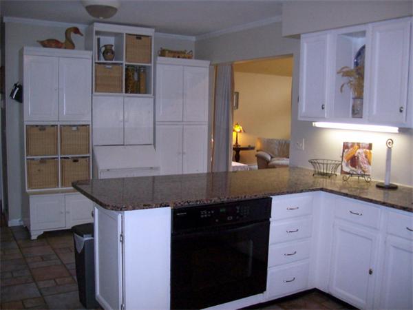 99 Westbrook Road Whately, MA 01373 - Photo 8 of 29 a kitchen with granite countertop a sink stainless steel appliances and cabinets