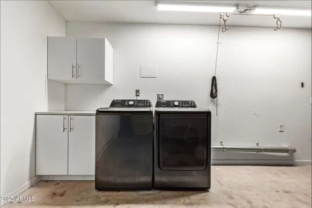 a view of empty room with a fireplace
