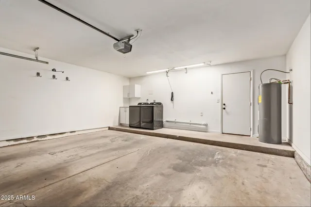 a view of a house with a tree