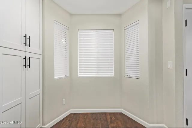 a view of a room that has a window in it