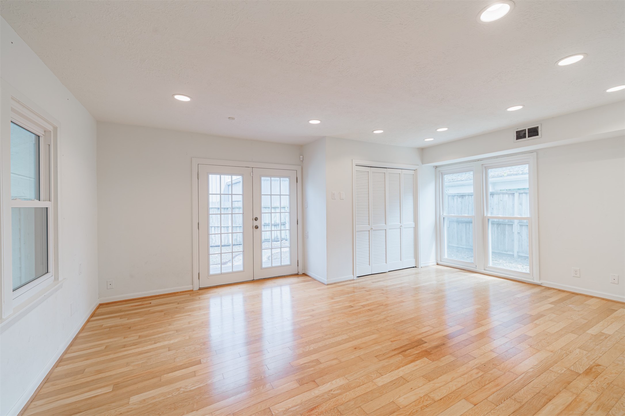 2438 Albans Road Houston, TX 77005 - Photo 18 of 35 Primary suite with double French doors that leads to the backyard.