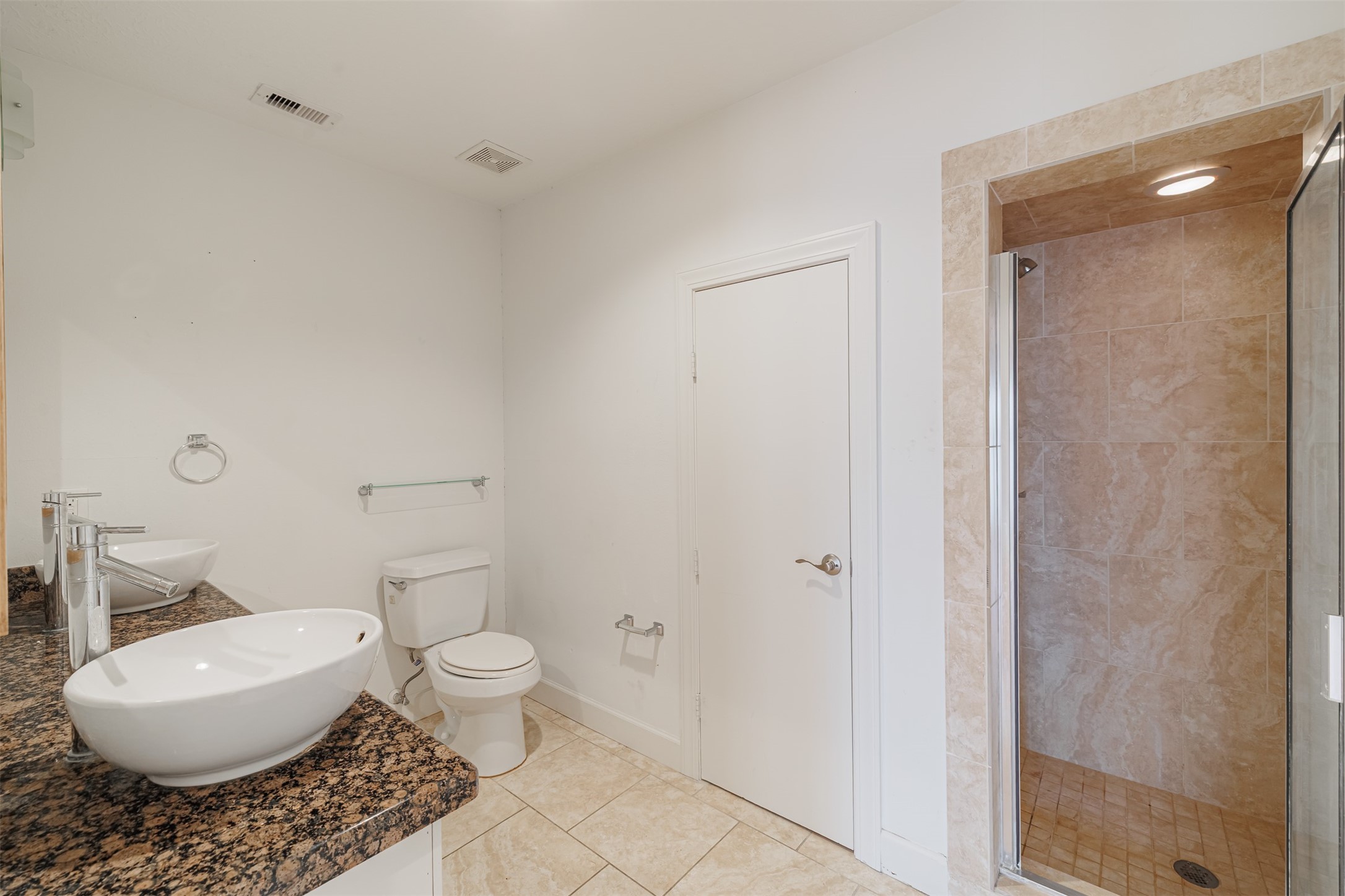 2438 Albans Road Houston, TX 77005 - Photo 21 of 35 Primary bath with walk-in shower.