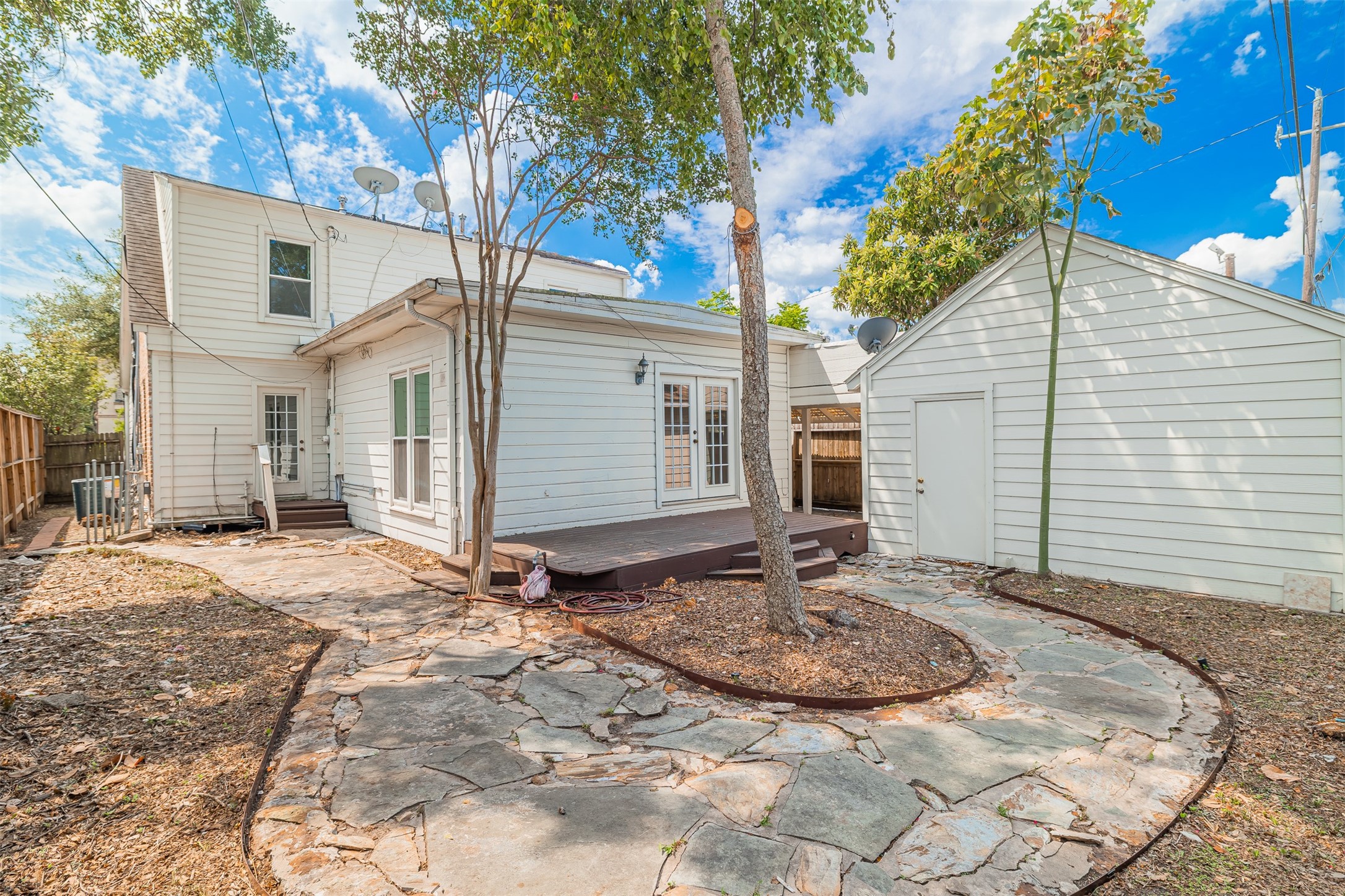 2438 Albans Road Houston, TX 77005 - Photo 30 of 35 Fenced backyard with patio/deck area