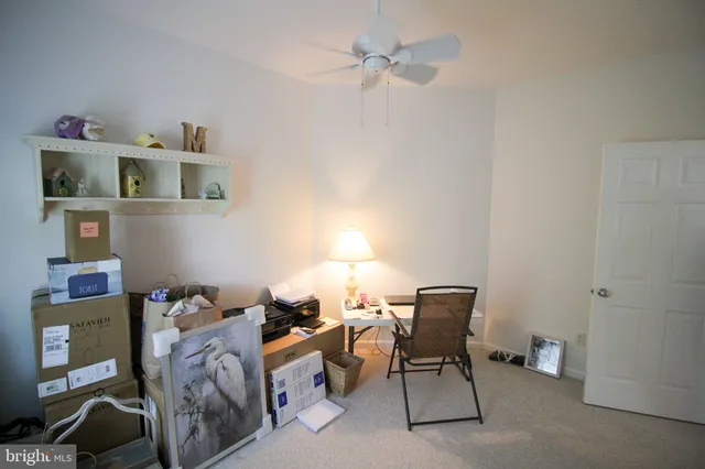 a living room with furniture and decor